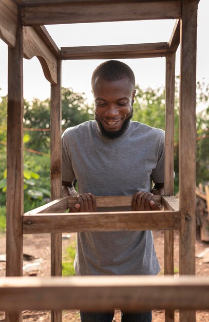 Free photo medium shot smiley man working