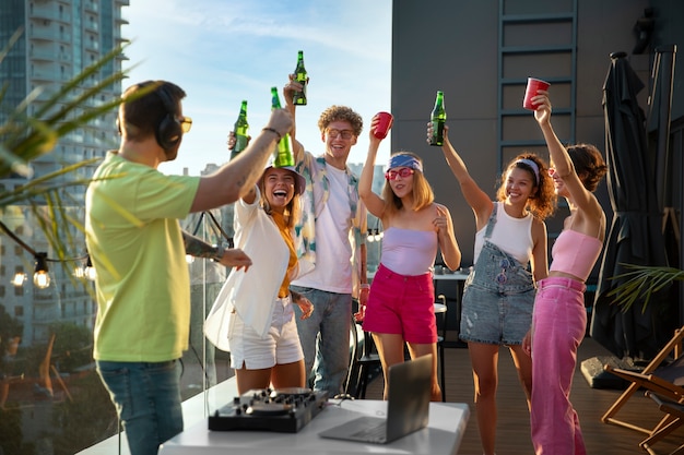 Medium shot smiley people dancing outdoors