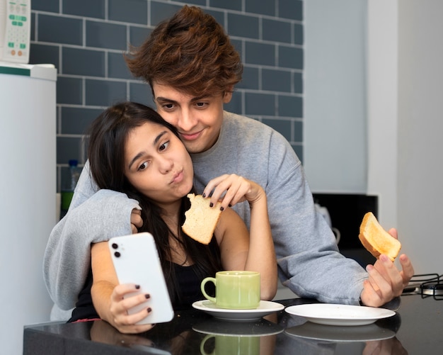 Medium shot smiley people taking selfie