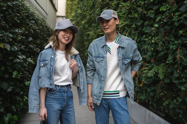 Free photo medium shot smiley people wearing trucker hats