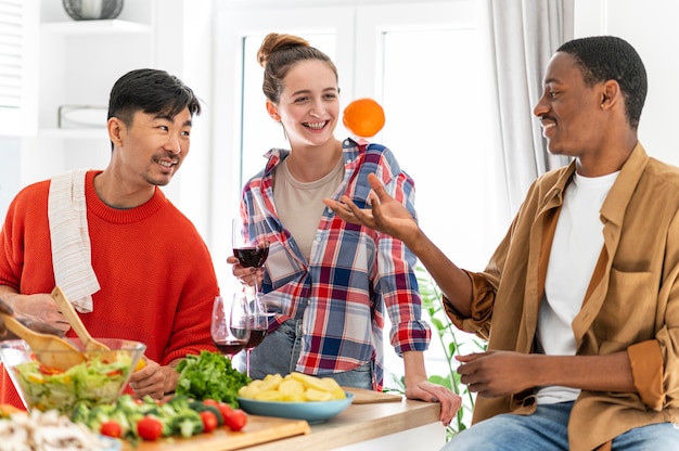 Medium shot smiley roommates in kitchen