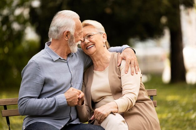 Medium shot smiley senior couple