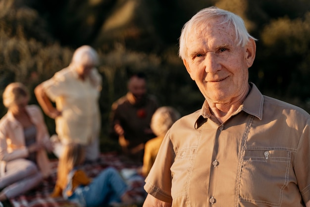 Free photo medium shot smiley senior man