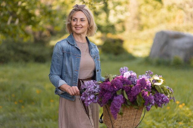 Medium shot smiley woman in nature