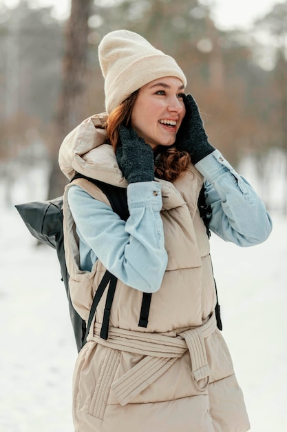 Medium shot smiley woman outdoors