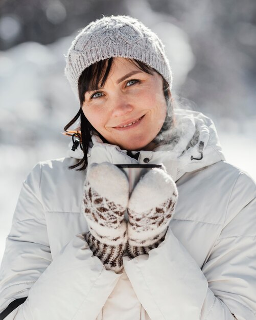 Medium shot smiley woman outdoors