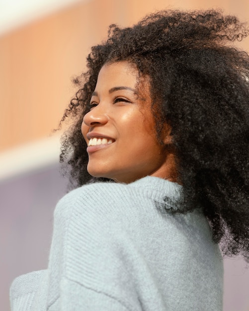 Medium shot smiley woman outdoors