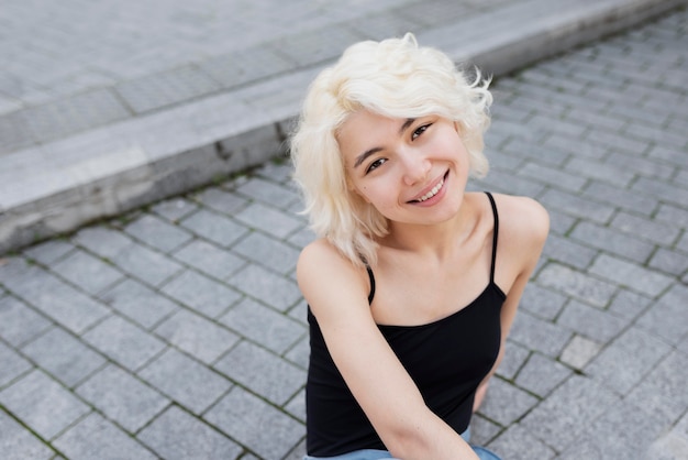 Medium shot smiley woman outdoors