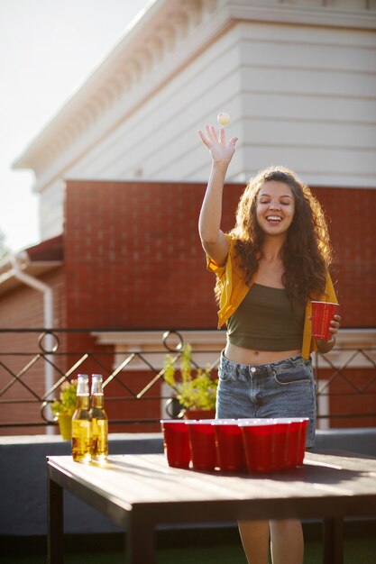 Medium shot smiley woman at party