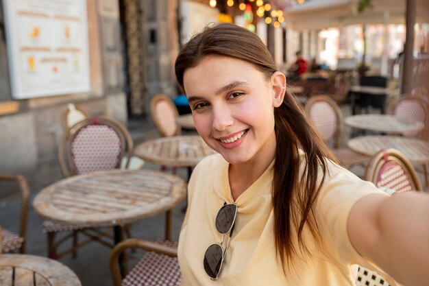 Medium shot smiley woman posing