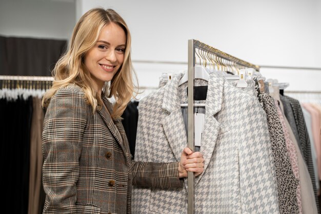 medium shot smiley woman shopping