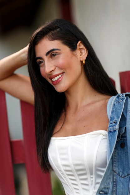 Medium shot smiley woman spending time outdoors