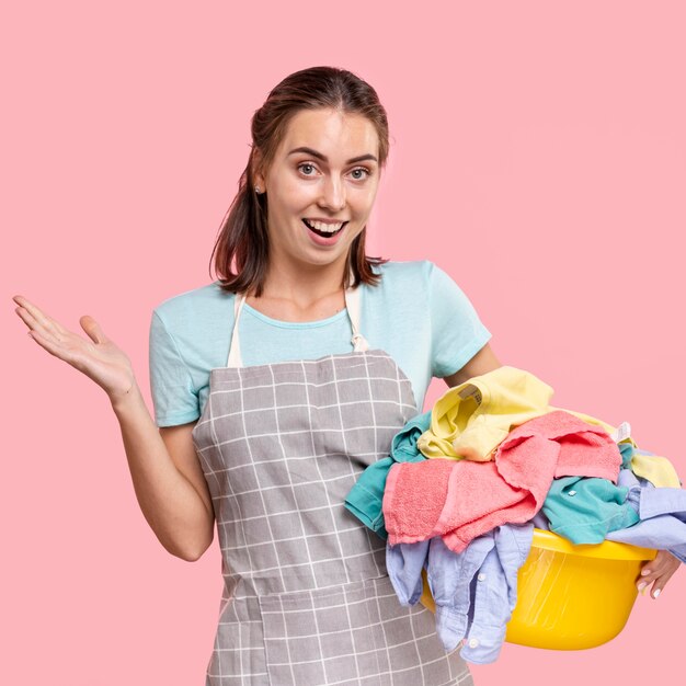 Medium shot smiley woman with apron