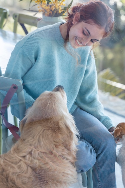 Medium shot smiley woman with dog