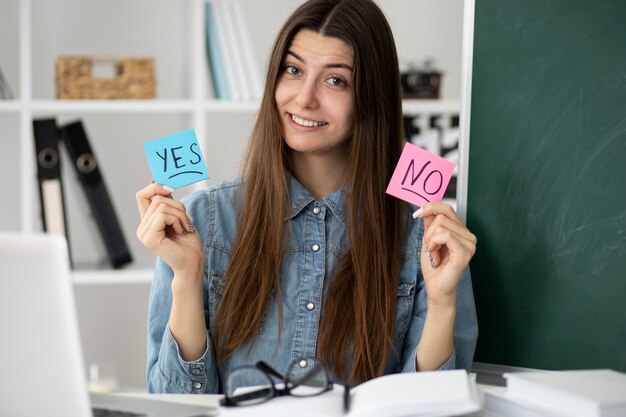 Medium shot smiley woman with post its