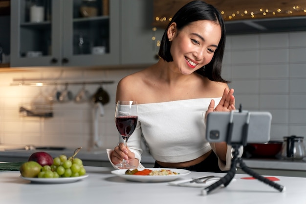 Medium shot smiley woman with wine glass