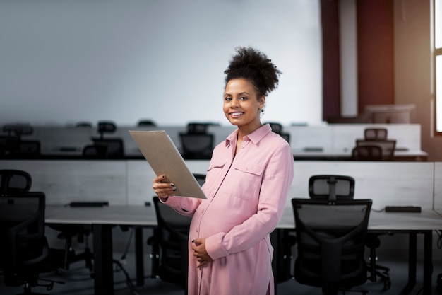 Medium shot smiley woman at work