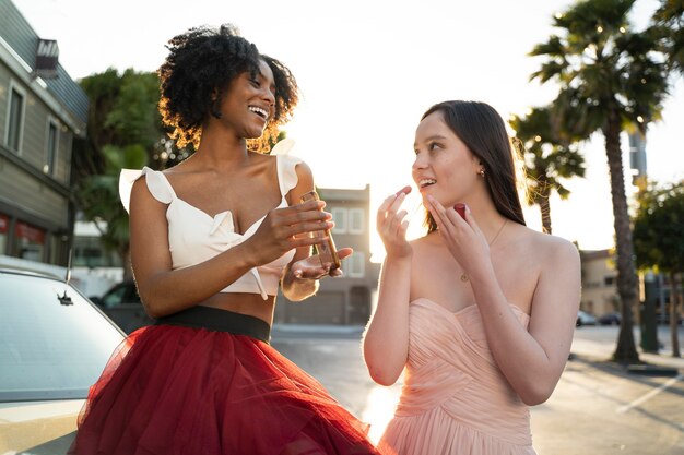 Medium shot smiley women outdoors