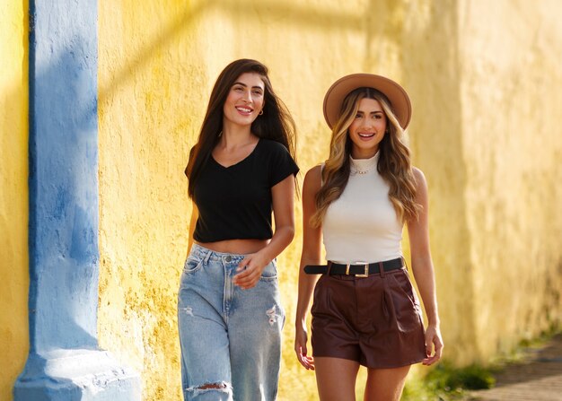 Medium shot smiley women spending time outdoors