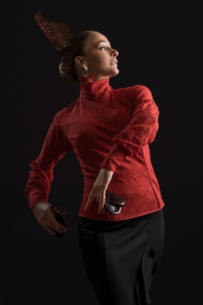 Medium shot spanish woman posing in studio