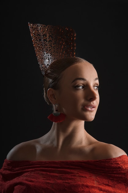 Medium shot spanish woman posing in studio