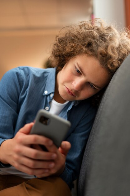medium shot suffering teenager being cyberbullied