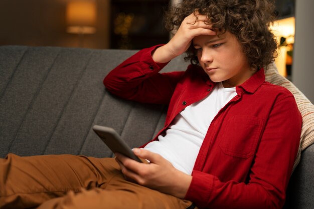 medium shot suffering teenager being cyberbullied