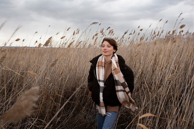 Free photo medium shot teen walking in nature