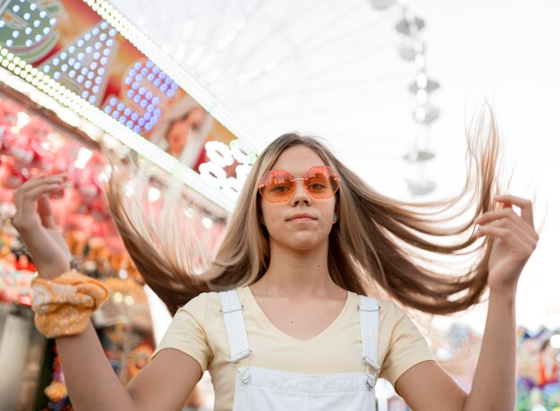 Medium shot teenage girl posing