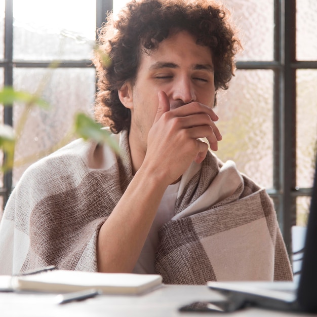 Free photo medium shot tired man indoors