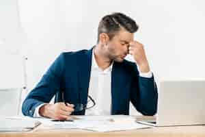 Free photo medium shot tired man with glasses