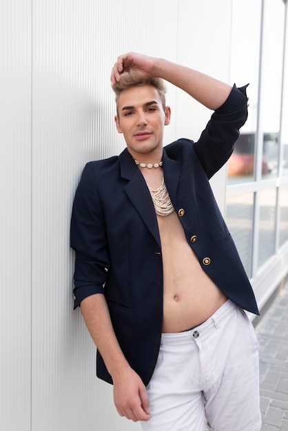 Medium shot transgender posing with jewelry