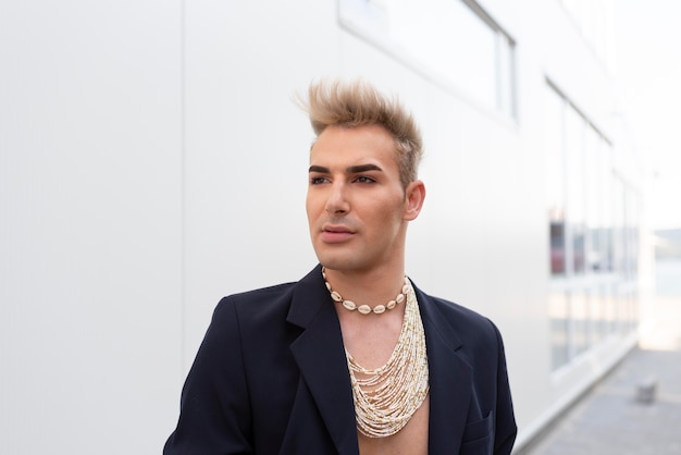 Medium shot transgender wearing jewelry