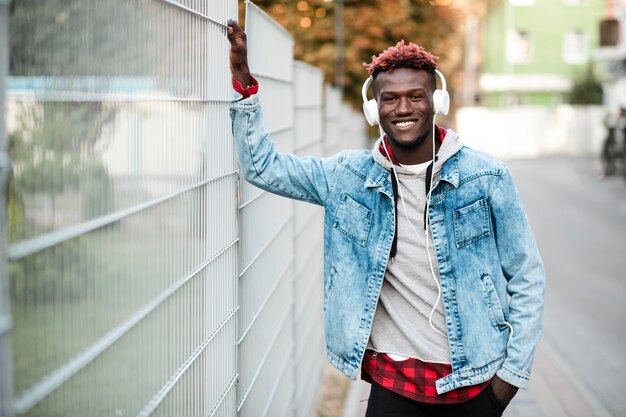 Medium shot trendy guy with headphones