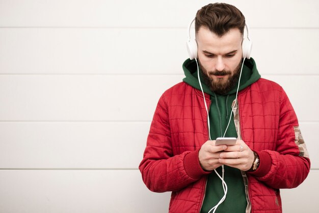 Medium shot trendy guy with headphones