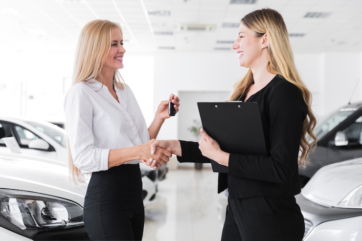 Free Photo medium shot of two blonde women looking at each other