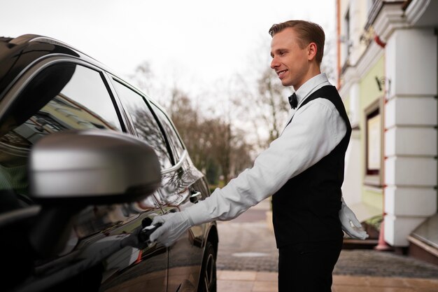 Medium shot valet parking car