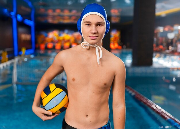 Medium shot waterpolo  player with equipment