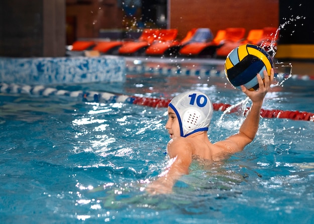 Medium shot waterpolo  player with equipment