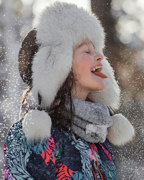 Free photo medium shot with tongue out outdoors