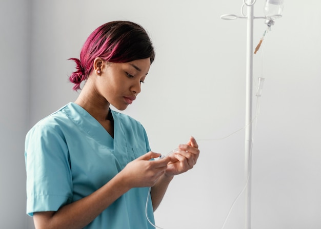 Medium shot woman adjusting perfusion