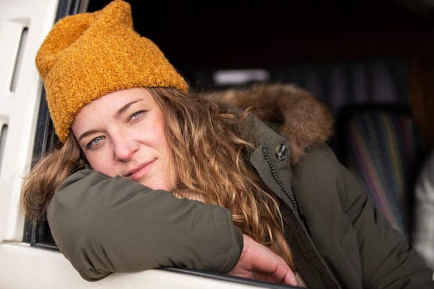 Medium shot woman in campervan