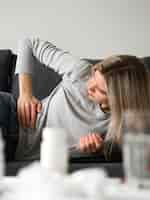 Free photo medium shot woman on couch