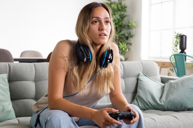 Medium shot woman on couch