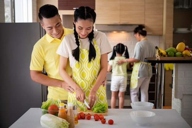 Medium shot woman cutting vegetables