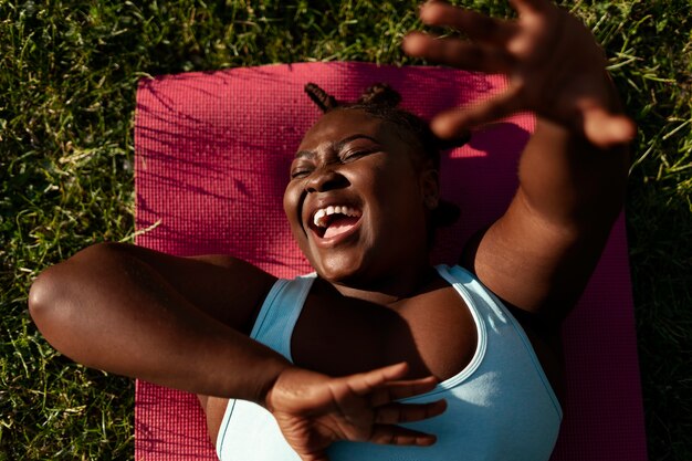 Medium shot woman doing sport