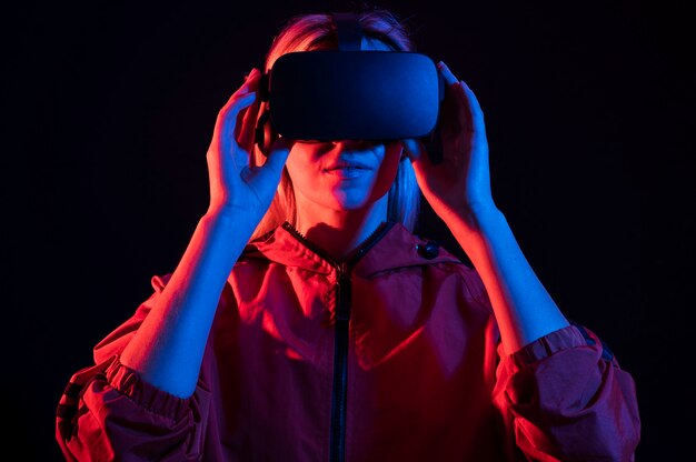 Medium shot woman experiencing virtual reality