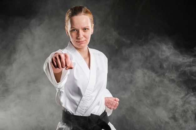 Free photo medium shot of woman fighter