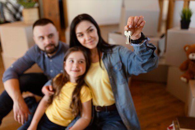 Medium shot woman holding keys