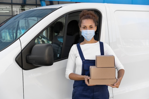 Medium shot woman holding package